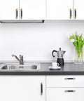Modern kitchen with Ten Pack Knurled Cabinet Handles Center To Center Five Inch Black And Champagne Copper Kitchen Cabinet Hardware installed.
