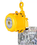 Spring Balancer Tool Hoist Stand With Manual Lock Adjustment And Power Tool Weight Slinger designed to slash wrist strain in yellow.