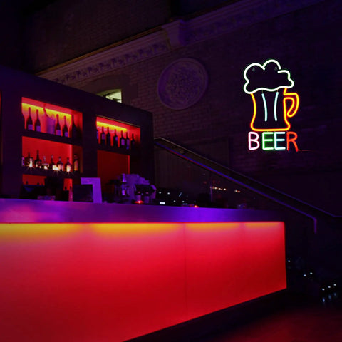 Colorful Beer Mug Neon Sign Led Neon Light For Wall Decor USB Powered 16.5 By 10.1 Inch in a bar setting, glowing vividly