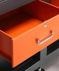 Industrial Grade Steel Workbench Featuring Two Secure Locking Drawers And Quick Access Shelf with open orange drawer.
