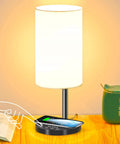 Multifunctional Table Lamp With 10W Fast Wireless Charger, USB Port, Five Brightness Levels And Five Lighting Modes on nightstand.