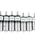 Power Up Your Projects With This Sleek Dc Low Speed Micro Planetary Gear Motor Featuring Insane Long Life And Huge Torque For Industrial Automation Or Cool Robot Builds with six DC motors in a row.