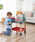 Child using Vehicle Service And Repair Workbench Play Set With Realistic Tools For Young Builders Includes Drill Hammer Saw