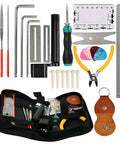Pro Grade Guitar Repair Tool Kit with pliers, hex wrenches, files, string action ruler, spanner wrench, picks, and storage case.