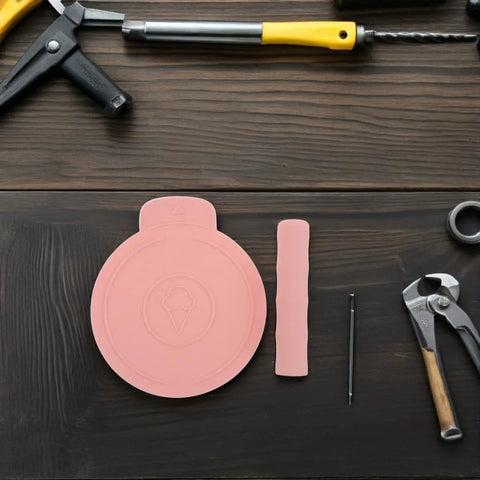Two Pack Silicone Ice Cream Maker Sleeves Compatible With Ninja Creami Series shown with tools on wooden table