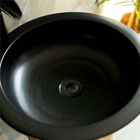 Slick Ceramic Vessel Sink With Retro Industrial Pedestal Basin Design High Gloss Scratch Resistant Glaze top view of black basin.