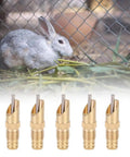 Auto Flow Rabbit Water Feeder Kit With Hose Hookup For Small Critters And Poultry Coops featuring five brass nipples beside a rabbit.