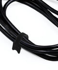 150 Piece Cat Head Cable Management Straps Heavy Duty Nylon Wire Ties holding black cables neatly bundled.