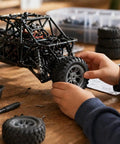 Hands assembling 4 Piece 60mm Toy Car Wheel Set With Rubber Tires And 3mm Shafts For RC Cars Trucks Robots And DIY Model Projects Rad