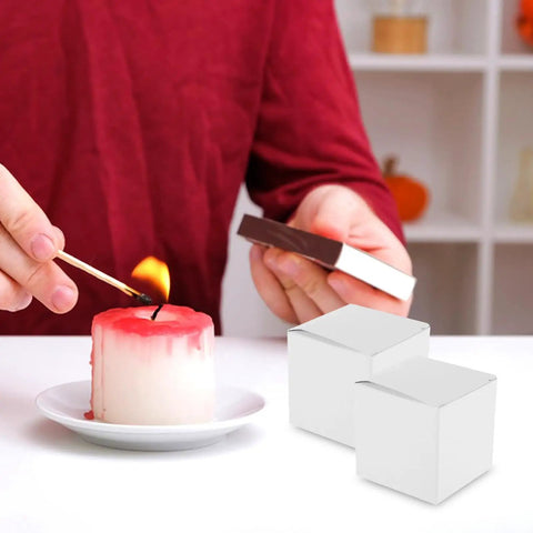 Lighting a candle next to White Square Cardboard Boxes Set Of 10 Easy Assembly Packaging Boxes For Essential Oils Coffee Cups Candles And Gifts Giftable Multipurpose Small Business Packaging Supplies For Retail.