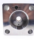 Front view of brushed metal waterjet intensifier end bell plate with central circular bore and four mounting holes.