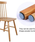 Heavy Duty Chair Leg Floor Protectors And Furniture Sliders With Bumper Glides For Hardwood Surfaces That Deliver A Slick Smooth Glide And Top Tier Scratch Defense While Keeping Your Floors Fresh In A Solid 20 Piece Set, shown on a wooden chair leg.