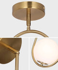 Gold Globe Pendant Light Fixture With Adjustable Hanging Length, Modern Mid Century Chandelier detail, brushed brass finish