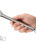 Hand holding 19 mm wrench from 19 Piece Metric Combination Wrench Set With Rack, Angled Open Ends, Heavy Duty for Mechanics