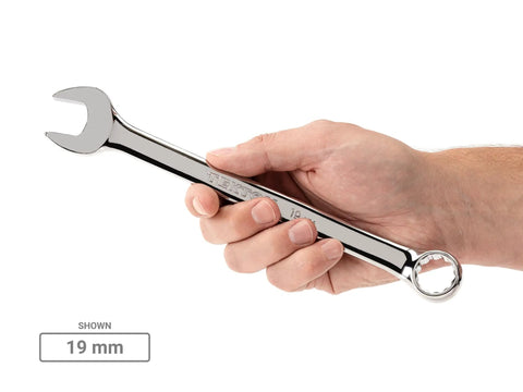 Hand holding 19mm wrench from 46-Piece Combination Wrench Set With Pro Grade Modular Organizers Inch And Millimeter Wrenches For Tight Spaces