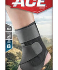 Deluxe Ankle Stabilizer With Adjustable Support In Black 1 Pack shown in packaging on mountain background
