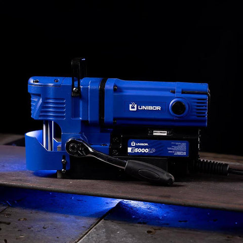 Unibor low-profile magnetic drill press in blue, 2-inch cutter capacity with LED work light.