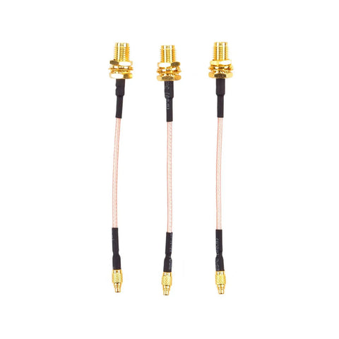 Three MMCX to SMA Female Antenna Extension Cables 95mm shown vertically, 3 Pack, gold-plated connectors, for FPV racing drones and quadcopters.