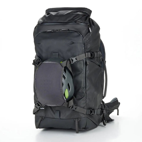 Action X70 HD Backpack in Army Green with helmet holder, roll-top closure, designed for outdoor photography and video gear expeditions.