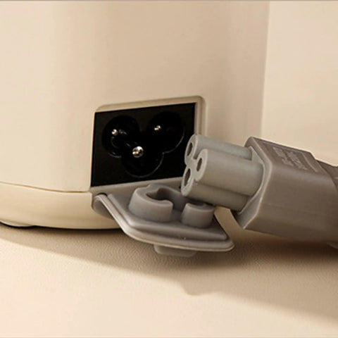 Self Heating Coffee Mug With Quick Temperature Display And Totally Spill Proof Lid showing electric plug connection.