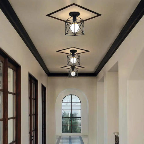 Three Retro Black Industrial Cage Ceiling Lights 2 Pack, Compact Semi Flush Mount Pendant Fixture With E27 Base in a hallway.