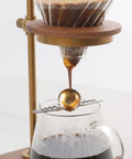 Coffee Ice Sphere Maker Stainless Steel Ball Mold under drip brewing setup for barista-grade cold brew iced coffee