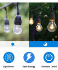 Outdoor Timer Outlet With Dusk To Dawn Sensor, Weatherproof, showing light and dark modes, ideal for Halloween and Christmas lights