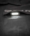 White LITE Hands Free LED Pocket Light With USB Rechargeable Power clipped on black uniform pocket illuminating fabric