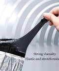 Person stretching Built Different Roof Underlayment Roll With Ice And Water Shield Heavy Duty Waterproof Membrane to show elasticity.