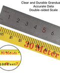 Close-up of open reel fiberglass tape measure showing imperial and metric double-sided scale, 330 foot length, rugged design.