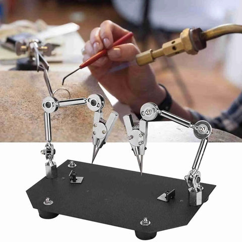 Heavy Duty Auxiliary Jewelry Welding Work Clip With Angle Adjustable Third Hand For Soldering Maintenance And Modeling Tasks In Workshop, showing hands using it.