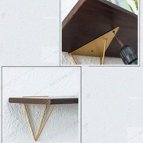 Rugged Triangle Shelf Bracket For Open Shelving Built Hella Solid With Matte Iron Wall Brackets And Dope Mid Century Hairpin Design showing installation of wooden shelf with gold bracket.