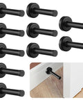 Heavy Duty Stainless Steel Door Stoppers With Rubber Tip Buffers in matte black finish, wall protectors installation example