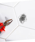 Hot Staple Repair Rods 100pcs For Automotive Bumper Repair Pre Cut Wave Staples beside red-handled pliers on white surface.