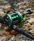 Round Baitcasting Fishing Reel With CNC Machined Aluminum Body 25Lb Max Drag Waterproof Trolling Reel in a stream setting