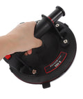 Heavy Duty Glass Suction Cup Lifter With Pressure Gauge And Thickened Rubber Build held in hand, ideal for smooth surfaces.