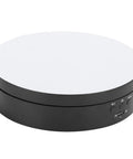 Electric Rotating Display Stand with black base and mirror top, USB powered, showcasing jewelry or cosmetics. Upgrade Your Game With This Sick Electric Rotating Display Stand Boasting 3 Speeds And 4 Adjustable Angles For Showcasing Jewelry Watches And Cosmetics Like A Boss On A Sleek Black Mirror Surface Turntable Base.
