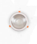 DJVHSRI Recessed Lighting Housing Trim Kits Recessed Spot Lamp view from above showing silver interior and orange clips.