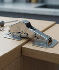 Heavy Duty Hydraulic Soft Close Cabinet Hinges With Rock Solid Buffer Dampers Crafted From Quality Cold Rolled Steel on wooden countertop.