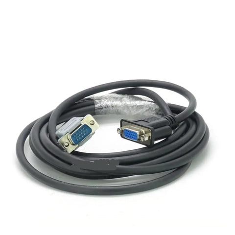 Close-up of a coiled black shielded serial cable with blue DB9 and DB15 connectors.