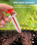 Hand using Six Piece Mini Seed Spreader Set For Tiny Seeds Handheld Sowing Dispenser With Dibber And Widger in soil