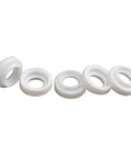 TIG Gas Lens Insulator Cup Gaskets For WP 9 20 25 Torch Direct Fit Pro Grade 54N63-20 And 598882 shown in a row of white rings