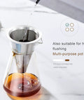 Heavy Duty Cold Brew Drip Tower With Adjustable Rate Dripper And Reusable Stainless Steel Filter pouring water into the stainless filter.