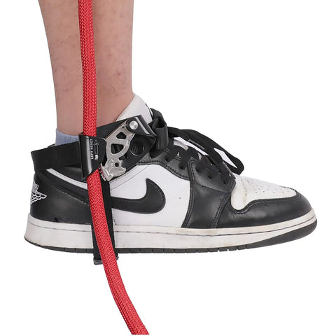 Foot Ascender Gear For Climbing And Rappelling Lightweight Aluminum Alloy attached to shoe with red rope