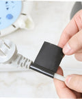 Applying 2 Pack PVC Repair Tape Leakproof Sealing Tape For PVC Pipe Joints Stop Leaks Weatherproof Water Resistant Gasket Strip on a cable