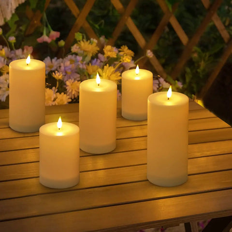 Solar Candles Outdoor Waterproof Flameless Pillar LED Lights Set Of 3 Dusk Till Dawn Auto On Off No Switch Needed displayed on table