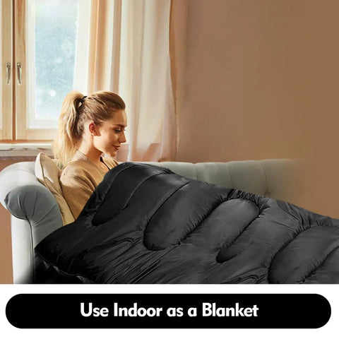 Woman using Two Person Sleeping Bag For All Seasons With Wraparound Zippers, Easily Splits Into Two Individual Bags as a blanket