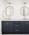 Three Light Vanity Wall Sconce With Explosion-Proof Frosted Glass Shade above bathroom mirrors, gold plated modern bath fixture.
