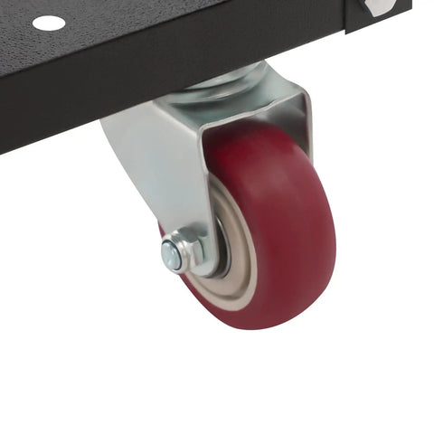 Badass Heavy Duty Rolling Planer Stand With Adjustable Height Extension Rollers And Smooth Gliding Wheels Supporting Up To 550 Pounds close-up of caster wheel with red rubber.