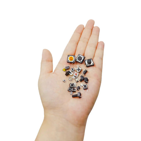 Hand holding Maker Friendly Assorted Micro Momentary Tactile Push Button Switch Kit With 375 Pieces And 26 Values